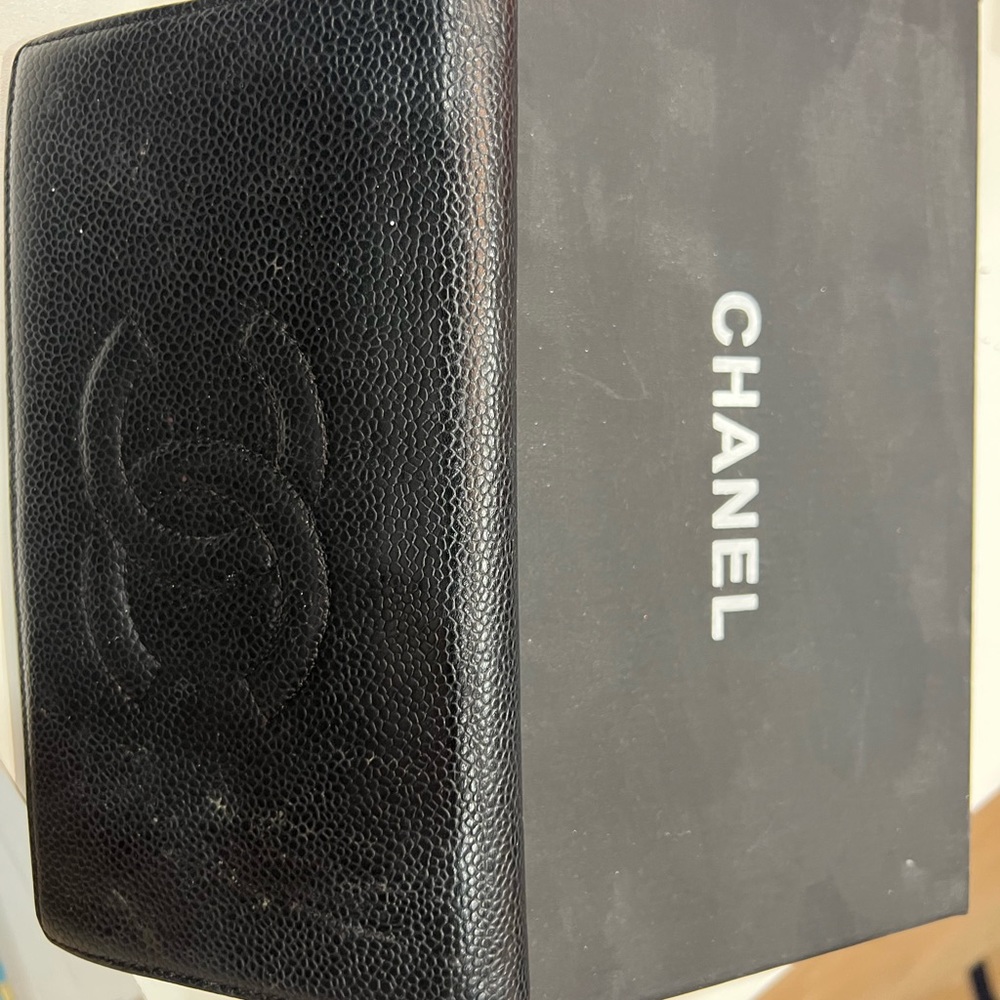 Authentic Chanel black  caviar full size wallet.
